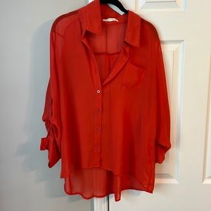 Orange mid length blouse